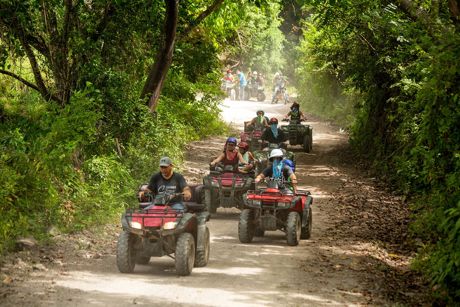 ATV riders in the jungle trails